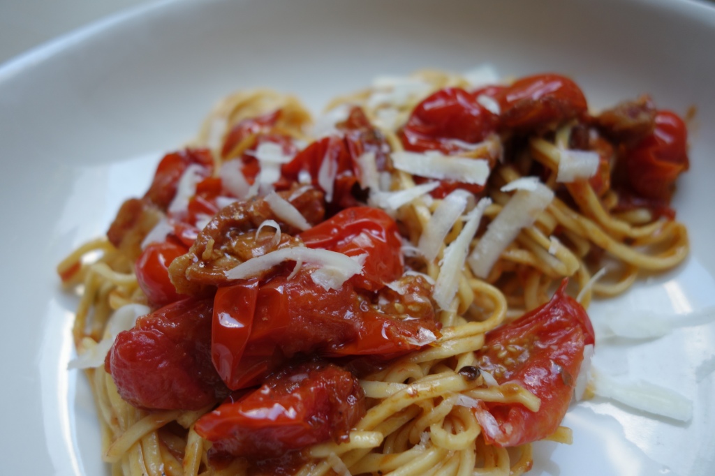 This is my all time favorite pasta dish. Its simple and rustic. The flavors are deep and savory. I tweeked the recipe a bit by using fresh Thai chiles and by using cherry tomatoes. They add a lovely sweetness to the sauce. 