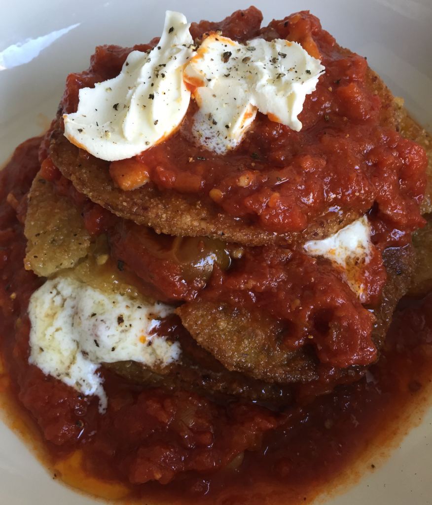 In today’s markets, you can get a huge variety of readymade specialties. My newest discovery is pre made eggplant cutlets from Trader Joe’s. Wow! Life is good and dinner is amazing!! In this recipe I skipped making it into a casserole, instead I created the fast, easy, delicious tower. 